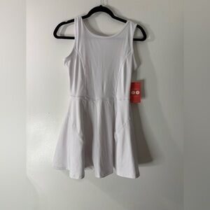White tennis dress with pockets size medium NWT